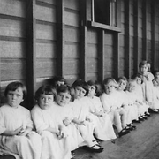 Small children waiting to be immunised at Nudgee Orphanage, Brisbane